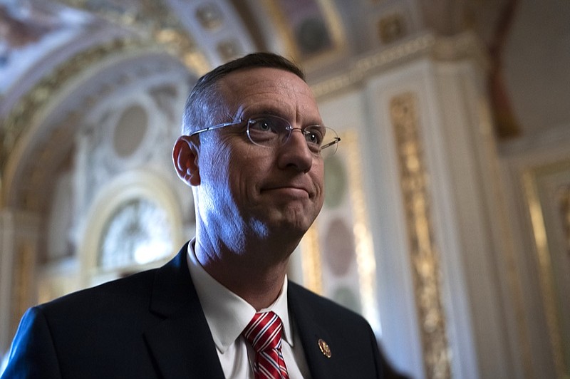 Rep. Doug Collins, R-Ga, the ranking member of the House Judiciary Committee, emerges from a conference room working with other allies of President Donald Trump during his impeachment trial, at the Capitol in Washington, Wednesday, Jan. 29, 2020. (AP Photo/J. Scott Applewhite)


