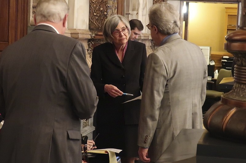 Kansas Senate President Susan Wagle, center, R-Wichita, confers with other Republican lawmakers and staffers during a debate a proposed amendment to the state constitution on abortion, Wednesday, Jan. 29, 2020, at the Statehouse in Topeka, Kan. Wagle backs the proposed amendment, which would overturn a Kansas Supreme Court decision protecting abortion rights. (AP Photo/John Hanna)


