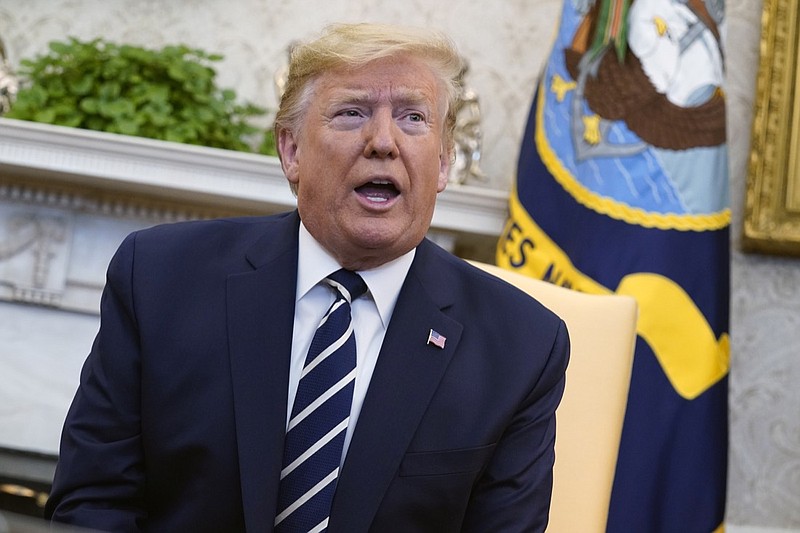 FILE - In this Jan. 27, 2020, file photo, President Donald Trump talks during a meeting in the Oval Office of the White House, in Washington. (AP Photo/ Evan Vucci, File)