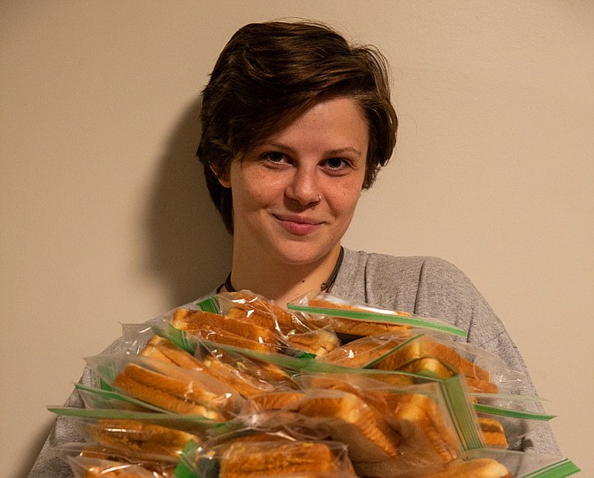 Elise Taylor is a University of Tennessee at Chattanooga graduate from Old Hickory, Tennessee, who makes sandwiches to help feed Chattanooga's homeless population. / Photo by UTC student Elian Richter