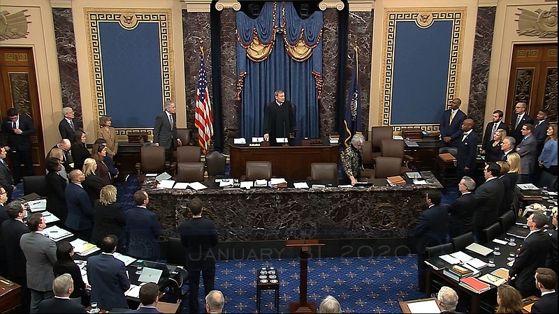Photo from Senate Television via The Associated Press / Presiding officer Chief Justice of the United States John Roberts calls the Senate into order as a Court of Impeachment during the impeachment trial against President Donald Trump in the Senate at the U.S. Capitol in Washington on Friday.