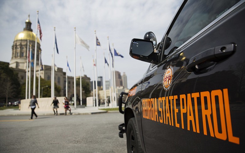 A Georgia state patrol vehicle sits outside the Capitol in Atlanta, Wednesday, March 22, 2017.