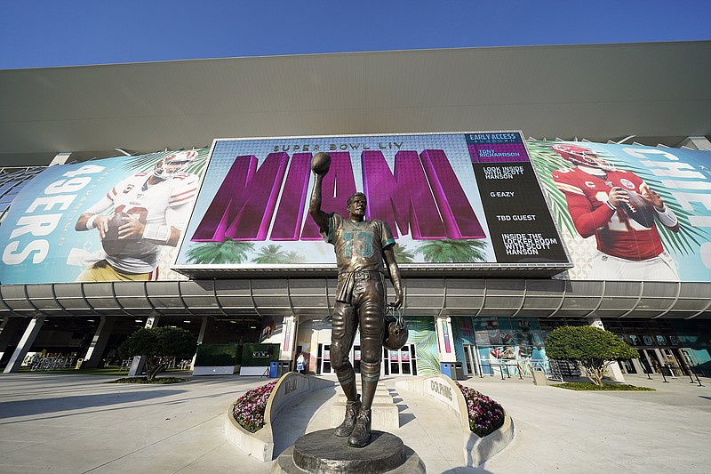A statue of Pro Football Hall of Fame quarterback Dan Marino is among the sights outside Hard Rock Stadium in Miami Gardens, Fla. The home of the Miami Dolphins will host Super Bowl LIV between the Kansas City Chiefs and the San Francisco 49ers on Sunday night. / AP photo by David J. Phillip