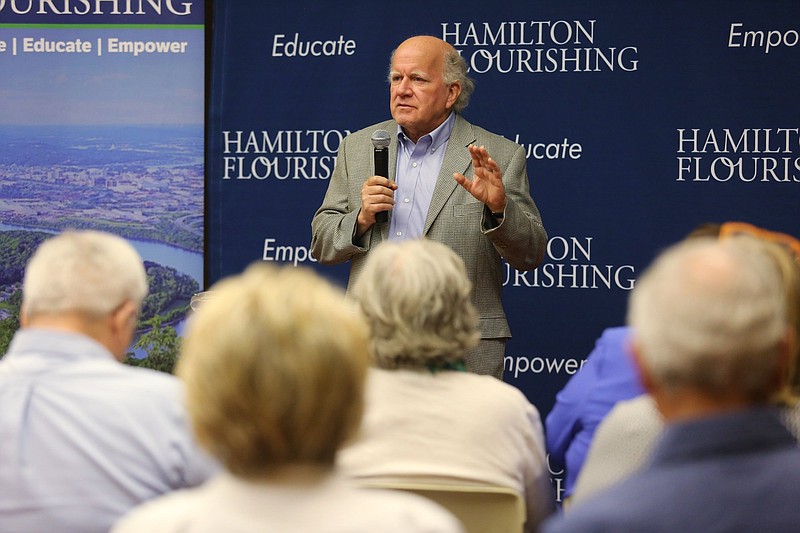 Staff photo by Erin O. Smith / Doug Daugherty, president of Hamilton Flourishing, introduces Stuart and Tamarah Goggans during an event at the Chattanooga Public Library Tuesday, August 20, 2019 in Chattanooga, Tennessee. The event was part of Hamilton Flourishing's monthly educational event series. 