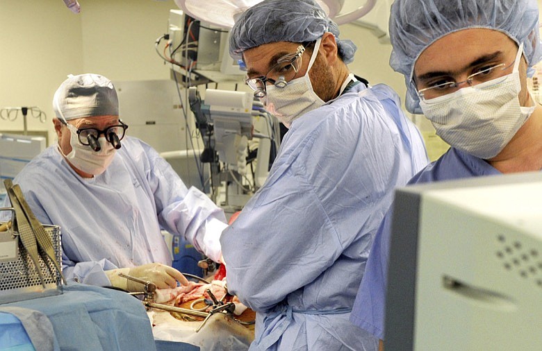 In this Sept. 13, 2011, file photo, Columbia University Medical Center Transplant Services surgeons watch a monitor as they perform a liver transplant at New York-Presbyterian Hospital in New York. Long-delayed rules that will more broadly share scarce donated livers go into effect Tuesday, Feb. 4, 2020. The aim is to make the wait for livers, and eventually all organs, less dependent on your ZIP code. (Keelin Daly/Hearst Connecticut Media via AP, File)