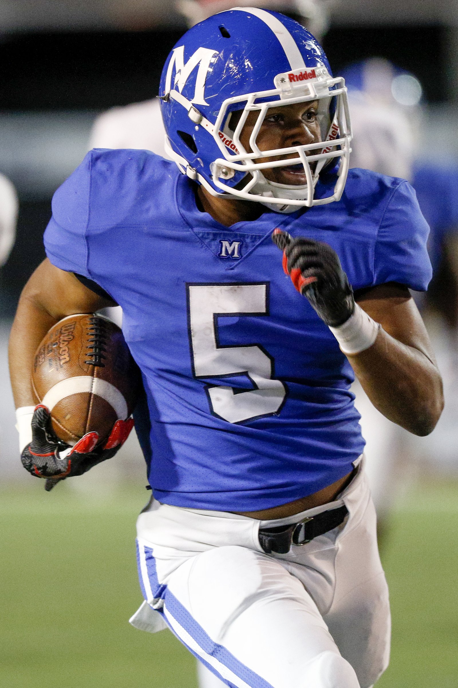 Staff photo by C.B. Schmelter / McCallie's B.J. Harris (5) rushes for a 49-yard gain against MBA during the Division II-AAA BlueCross Bowl state championship at Tennessee Technological University's Tucker Stadium on Thursday, Dec. 5, 2019 in Cookeville, Tenn.