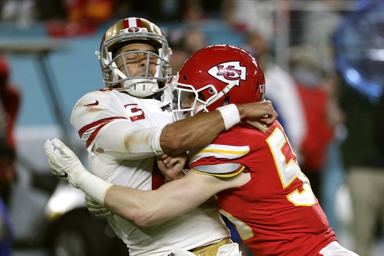 Kansas City Chiefs linebacker Ben Niemann, right, hits San Francisco 49ers quarterback Jimmy Garoppolo during the second half of the NFL Super Bowl 54 football game Sunday, Feb. 2, 2020, in Miami Gardens, Fla. (AP Photo/Matt York)