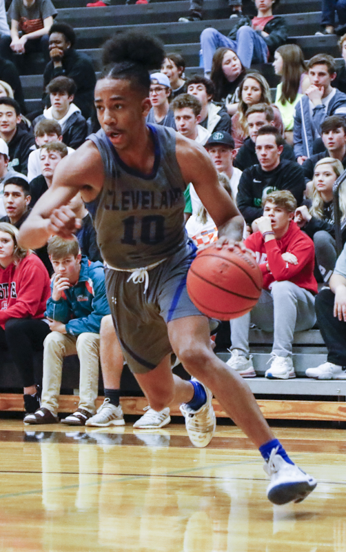 Staff photo by Troy Stolt / Cleveland's JaCobi Wood (10) drives toward the baske during the boys basketball game between Cleveland and East Hamilton at East Hamilton high school on Tuesday, Feb. 4, 2020 in Chattanooga, Tenn..