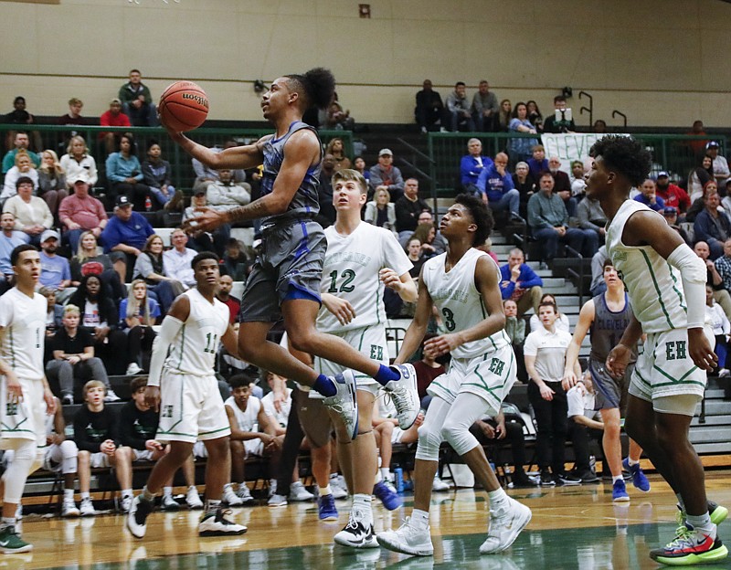 Staff photo by Troy Stolt / Cleveland's JaCobi Wood (10) the boys basketball game between Cleveland and East Hamilton at East Hamilton high school on Tuesday, Feb. 4, 2020 in Chattanooga, Tenn..