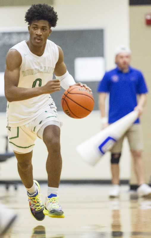 Staff photo by Troy Stolt / East Hamilton's Darwin Randolph (0) brings the ball down court during the boys basketball game between Cleveland and East Hamilton at East Hamilton high school on Tuesday, Feb. 4, 2020 in Chattanooga, Tenn..