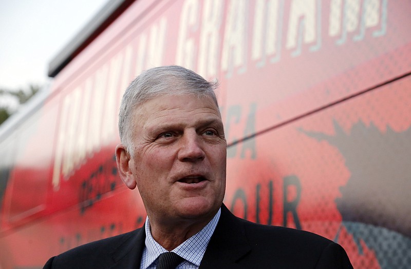 Photo by Chris Seward of The Associated Press / The Rev. Franklin Graham talks to the media before he speaks at his Decision America event at the Pitt County Fairgrounds in Greenville, North Carolina, in October 2019.