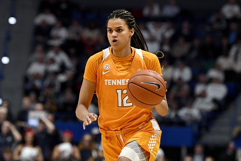 Tennessee's Rae Burrell dribbles upcourt during the first half against Connecticut on Jan. 23 in Hartford, Conn. The Lady Vols could use more offensive consistency from Burrell down the stretch of the season to take some of the pressure off leading scorer Rennia Davis. / AP photo by Jessica Hill