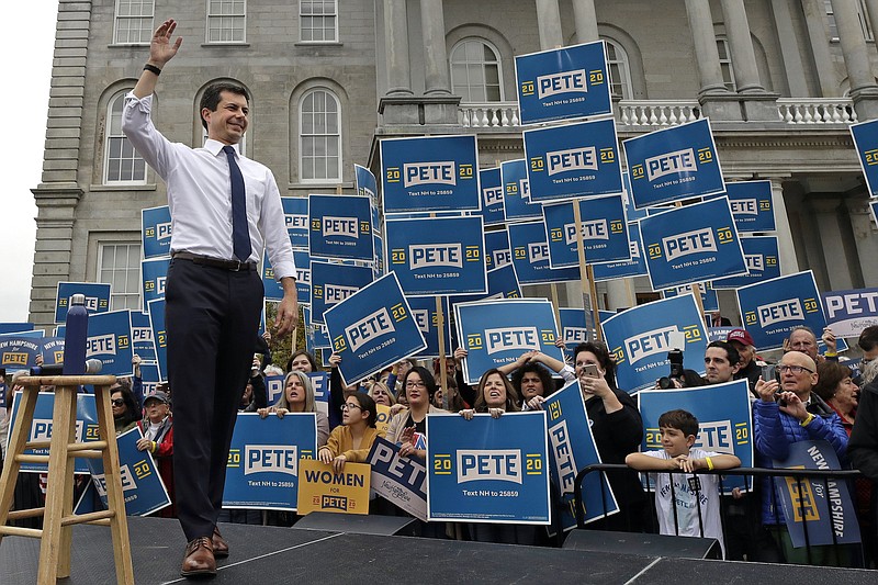 Photo by Elise Amendola of The Associated Press / Democratic presidential candidate South Bend, Indiana, Mayor Pete Buttigieg waves to supporters outside the Statehouse on Wednesday, Oct. 30, 2019, in Concord, New Hampshire.