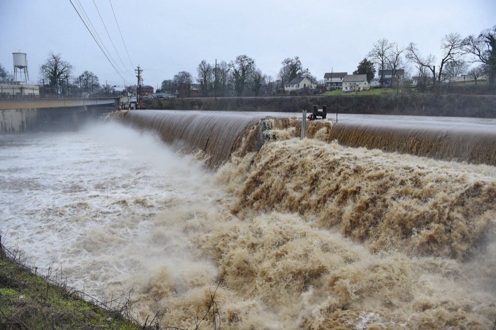 The Saluda River rages over a spillway after more than four inches of rain fell in Pelzer, S.C. Thursday, Feb. 6, 2020. (AP Photo/Richard Shiro)