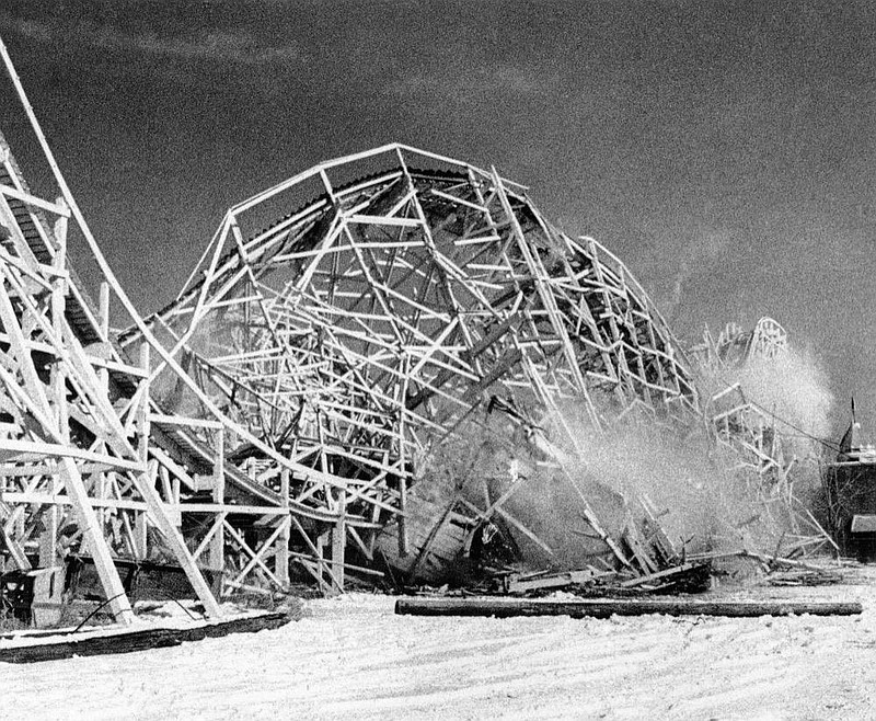 The Cyclone, Palisades amusement park’s roller coaster which has given thousands of pleasure seekers their "ups and downs” during the past 40 years, itself came down, Feb. 8, 1972. The Cliffside Park, N.J., landmark is shown just as it is pulled down by bulldozers. The amusement park site is being cleared for a high rise apartment project. (AP Photo/Marty Lederhandler)