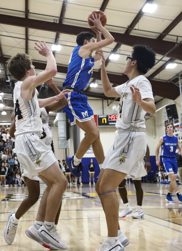 Staff photo by Troy Stolt / McCallie's Wilson Rankin (14) looks to pass during the boy's basketball game between Chattanooga Christian and McCallie at Chattanooga Christian on Friday, Feb. 7, 2020 in Chattanooga, Tenn.