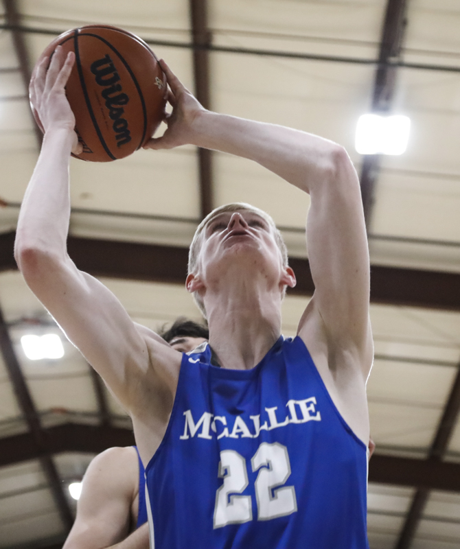 Staff photo by Troy Stolt / McCallie's Trey Hamilton (22) looks to shoot during the boy's basketball game between Chattanooga Christian and McCallie at Chattanooga Christian on Friday, Feb. 7, 2020 in Chattanooga, Tenn.
