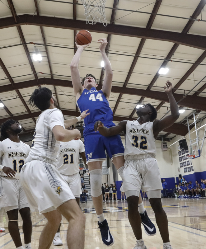 Staff photo by Troy Stolt / McCallie's David Craig (44) goes for a lay up during the boy's basketball game between Chattanooga Christian and McCallie at Chattanooga Christian on Friday, Feb. 7, 2020 in Chattanooga, Tenn.