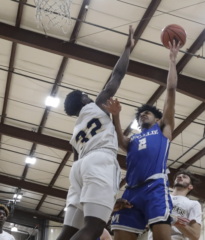 Staff photo by Troy Stolt / McCallie's Joryam Saizonou (2) lays the ball up during the boy's basketball game between Chattanooga Christian and McCallie at Chattanooga Christian on Friday, Feb. 7, 2020 in Chattanooga, Tenn.