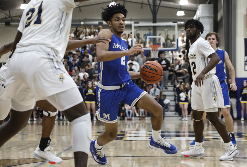 Staff photo by Troy Stolt / McCallie's Joryam Saizonou drives to the basket during Friday's 59-53 win at Chattanooga Christian.
