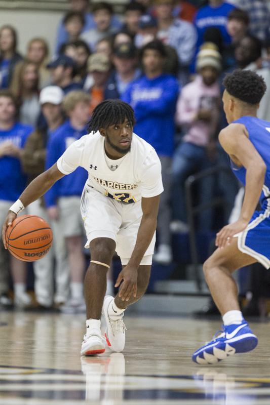 Staff photo by Troy Stolt / Chattanooga Christian's Traveon Scott (32) looks for an open lane during the boy's basketball game between Chattanooga Christian and McCallie at Chattanooga Christian on Friday, Feb. 7, 2020 in Chattanooga, Tenn.