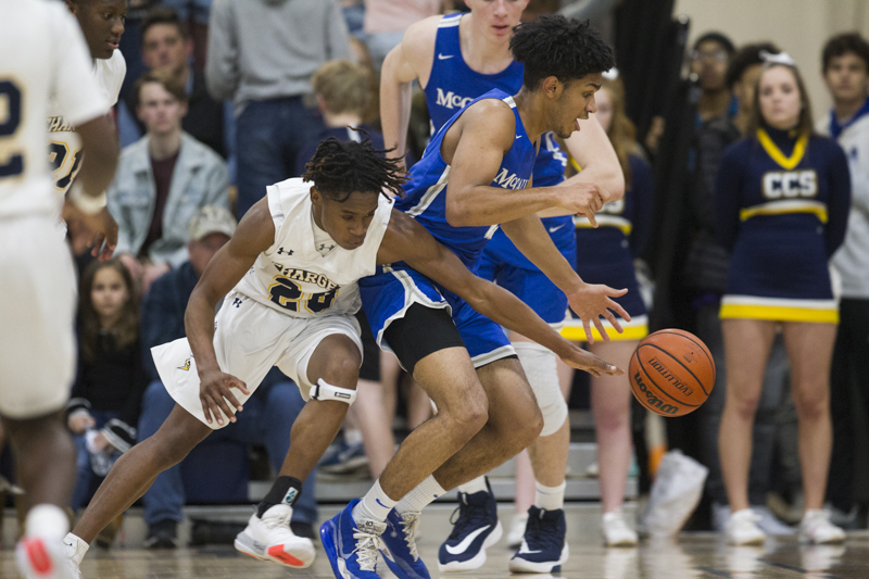 Staff photo by Troy Stolt / Chattanooga Christian's Dee Hinton (20) steals the ball from McCallie's Joryam Saizonou (2) during the boy's basketball game between Chattanooga Christian and McCallie at Chattanooga Christian on Friday, Feb. 7, 2020 in Chattanooga, Tenn.