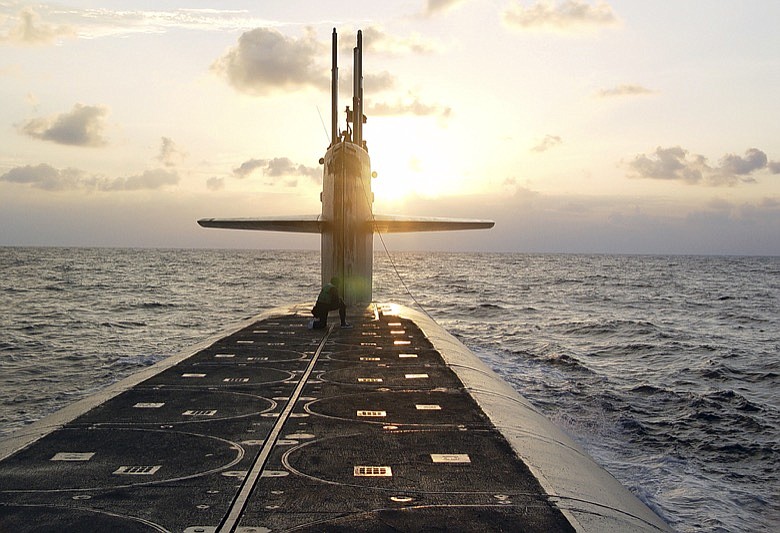 In this Jan. 9, 2008 photo released by the U.S. Navy, The Ohio-class ballistic-missile submarine USS Wyoming approaches Naval Submarine Base Kings Bay, Ga. The Pentagon's top policy official tells The Associated Press that the United States for the first time has deployed the newest addition to its nuclear arsenal — a submarine-launched weapon that the Trump administration says will make nuclear war less likely. (Lt. Rebecca Rebarich/U.S. Navy via AP)