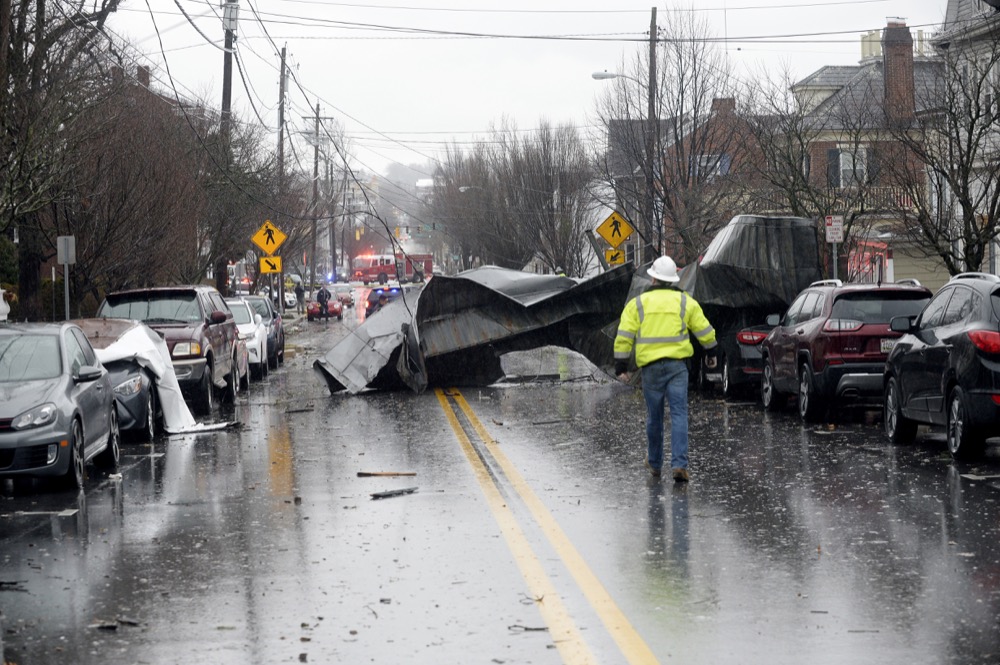 Emergency responders survey damage on West Main Street after a powerful storm swept through Friday morning, Feb. 7, 2020, in Westminster, Md. (Dylan Slagle/The Baltimore Sun via AP)
