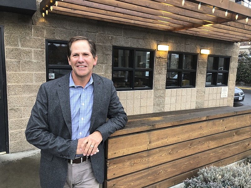 In this Jan. 27, 2020, photo, Knute Buehler, a Republican candidate for a seat in the U.S. House of Representatives, poses for a photo during an interview with The Associated Press in Bend, Ore. In 2018, the Republican party's candidate for governor of Oregon painted himself as a centrist, criticized President Donald Trump's environmental stance and said he didn't want to be linked to divisive national figures. Buehler lost to incumbent Gov. Kate Brown. Now, Buehler is running for a seat in Congress in a district covering a conservative swath of Oregon, and has taken Trump into a tight embrace. (AP Photo/Andrew Selsky)

