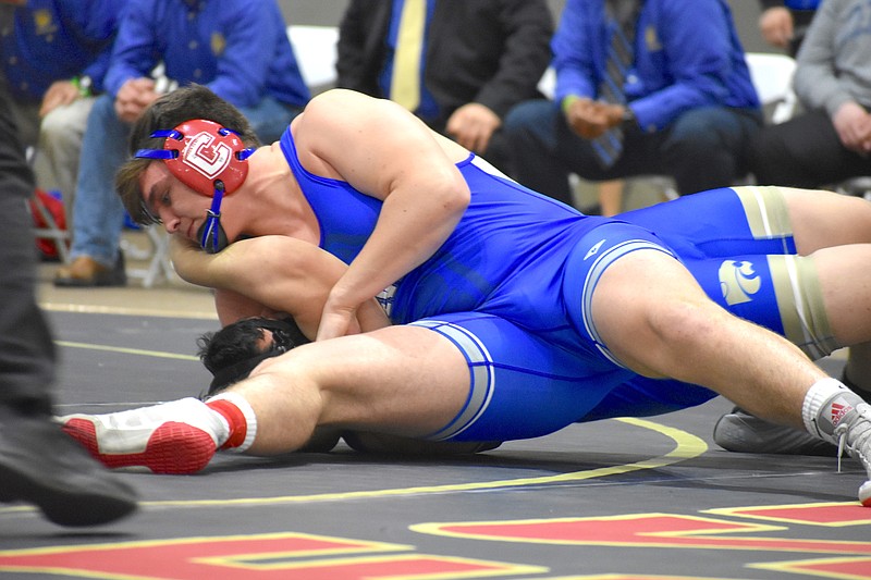 Staff photo by Patrick MacCoon / Cleveland sophomore 220-pounder Ashton Davis won all four of his matches at the TSSAA Class AAA state duals this weekend in Franklin to help the Blue Raiders earn their third straight championship.