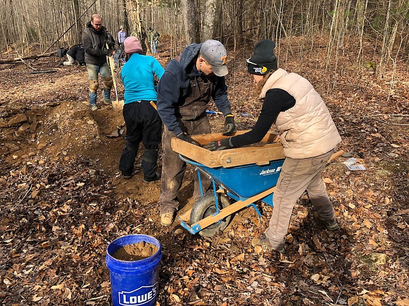 Photo contributed by the U.S. Forest Service / Crews worked over the past several days to repair damage to the Trail of Tears in Coker Creek, Tenn., done by the federal agency in 2014. Here, from left, Western Carolina University archeologists Jeff Koch and Karen Biggert dig out soil that is being screened by Beau Carroll and Jessica Bittner of the Eastern Band of Cherokee Indians. Crews including federal and tribal officials and volunteers have spent the last several days repairing an estimated $2.4 million in damage.