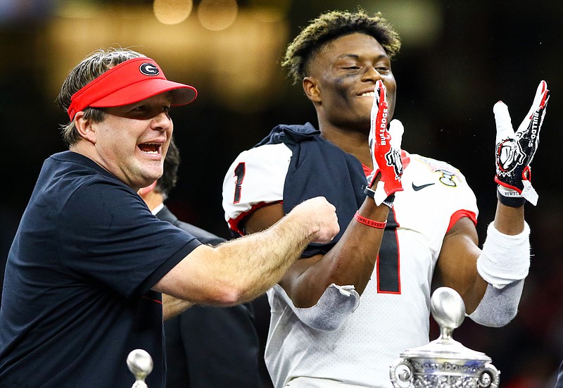 Georgia photo by Chamberlain Smith / Kirby Smart, left, has a lot of new pieces for Georgia's offense ahead of his fifth season as head coach, and receiver George Pickens, right, is expected to have a key role after capping his freshman season by earning Sugar Bowl MVP honors.