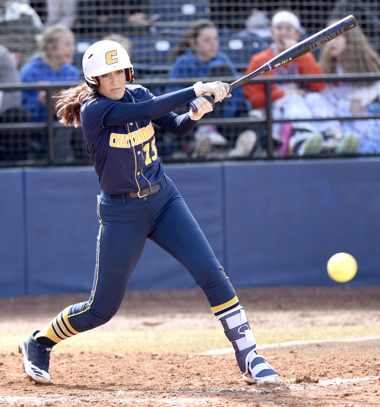 Staff Photo by Robin Rudd / UTC's Emma Sturdivant (13) hits the ball down the first baseline. The University of Tennessee at Chattanooga Mocs defeated the Austin Peay Governors in NCAA softball 9 to 1 in the first game at Jim Frost Stadium on February 9, 2020.