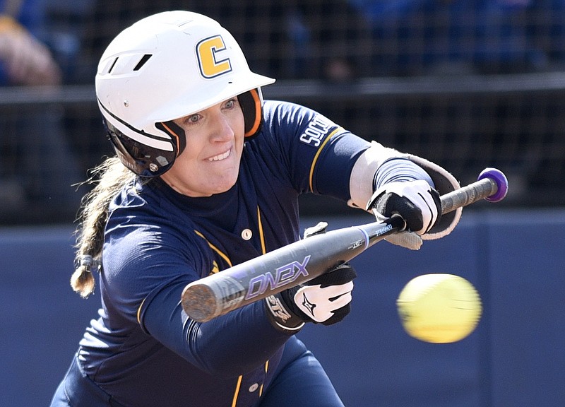 Staff Photo by Robin Rudd / UTC softball player Katie Corum lays down a sacrifice bunt during the Mocs' 2020 season opener, a 9-1 win against Austin Peay on Feb. 9. The Mocs are playing at home again this weekend during their Chattanooga Challenge event.