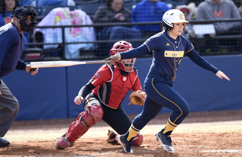 Staff Photo by Robin Rudd / UTC's Hayleigh Weissenbach (4) follows through on a hit. The University of Tennessee at Chattanooga Mocs defeated the Austin Peay Governors in NCAA softball 9 to 1 in the first game at Jim Frost Stadium on February 9, 2020.