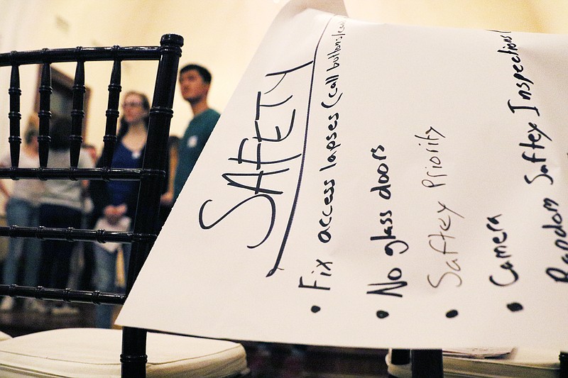 An easel pad paper is draped over a chair with safety measure ideas following a Chattanooga Student Leaders brainstorming session Sunday, Feb. 25, 2018 at 901 Lindsay Venue in Chattanooga, Tenn. Students and teachers from at least 10 Chattanooga area schools met together Sunday evening to brainstorm ideas to increase safety measures at schools.