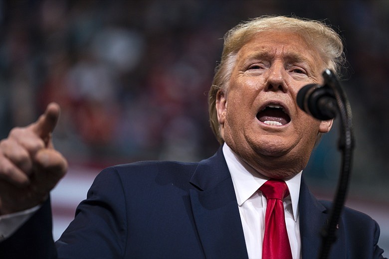 President Donald Trump speaks during a campaign rally Monday, Feb. 10, 2020, in Manchester, N.H. (AP Photo/Evan Vucci)