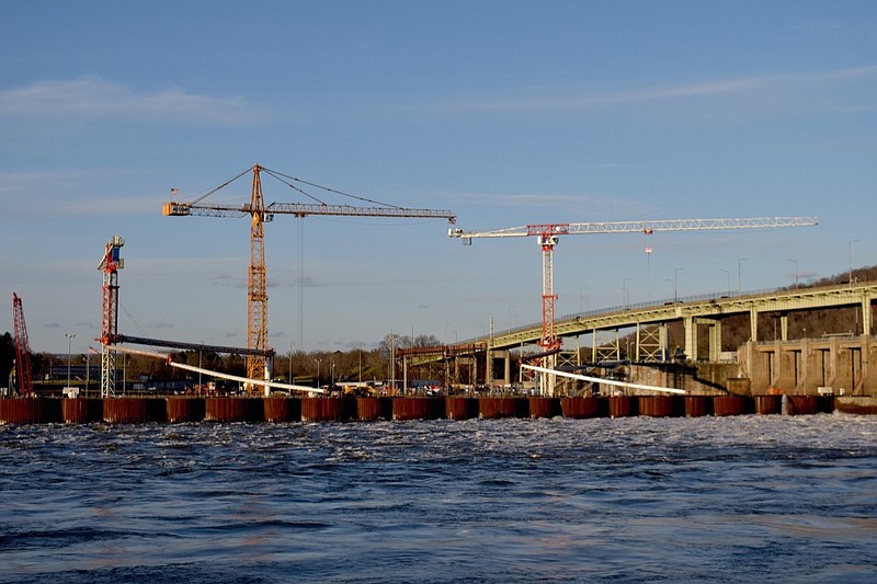 Staff Photo by Robin Rudd/ Cranes stand above the cofferdam around the construction for the new Chickamauga Dam Lock. 