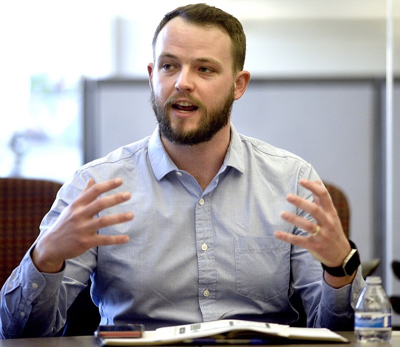 Tyler Yount, director of special projects for the mayor's office, discusses efforts to end homelessness in Chattanooga with the editors of the Times Free Press at the newspaper's offices on Dec. 4, 2018. / Staff file photo