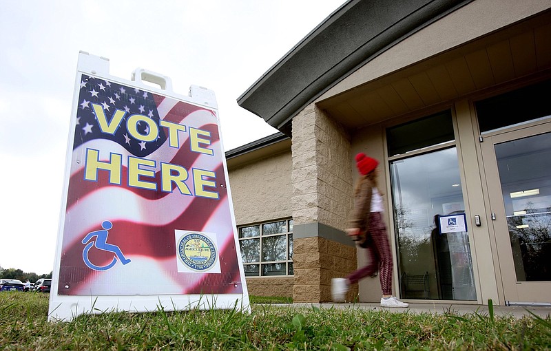 Staff photo by Erin O. Smith / A voter walks in the entrance at the Hamilton County Election Commission Wednesday, Oct. 31, 2018, in Chattanooga, Tennessee, to vote early.