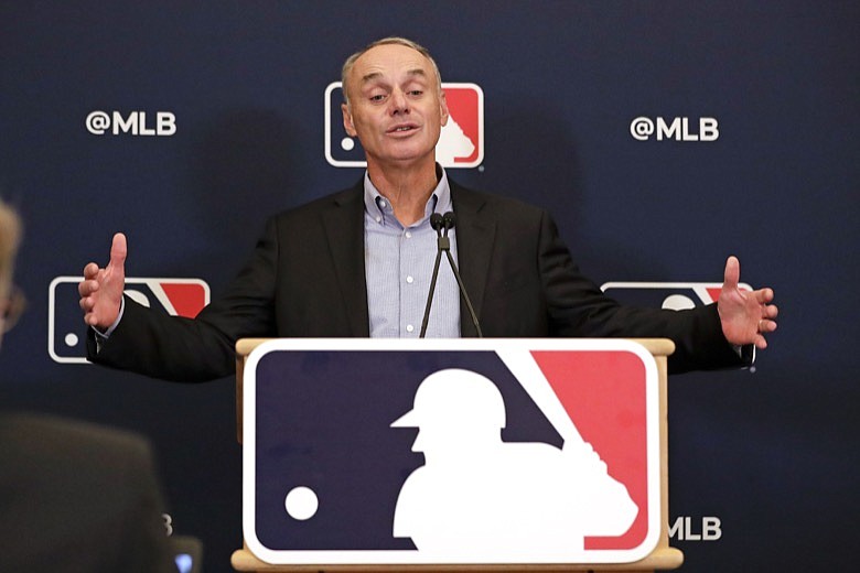 AP photo by John Raoux / MLB commissioner Rob Manfred answers questions during a news conference at the league's owners' meetings on Feb. 6 in Orlando, Fla.