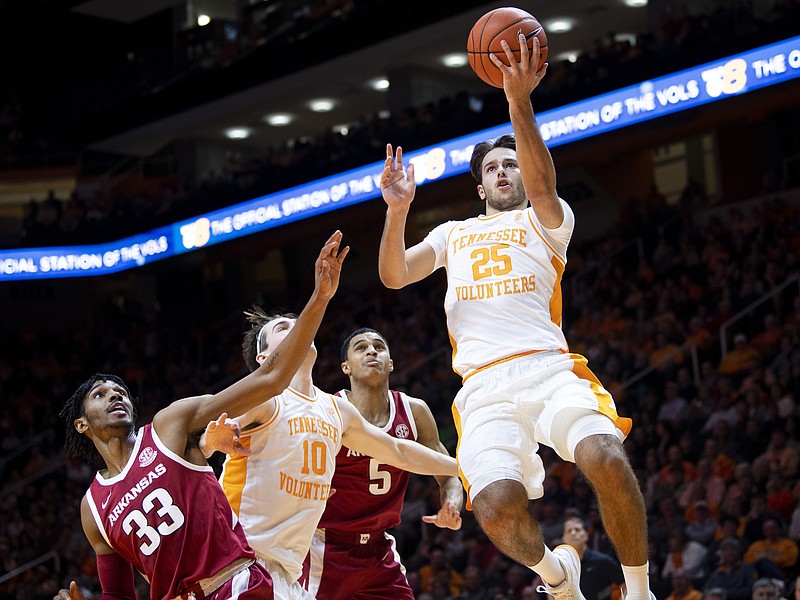 Tennessee guard Santiago Vescovi (25) attempts a shot against Arkansas on Tuesday, Feb. 11, 2020, in Knoxville. Vescovi scored 20 points. (Brianna Paciorka/Knoxville News Sentinel via AP)