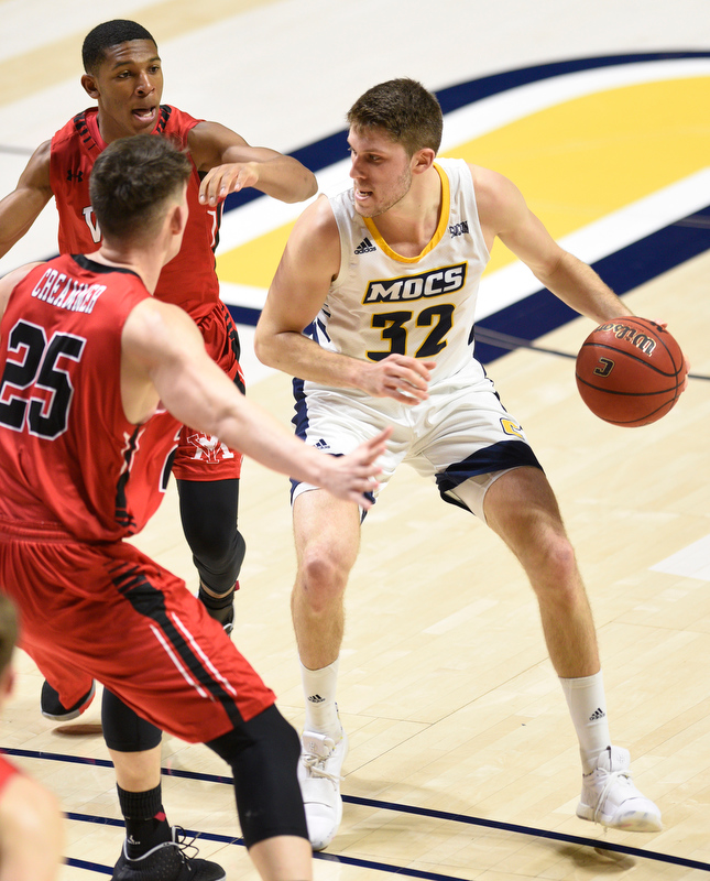 Staff Photo by Robin Rudd / UTC's Matt Ryan (32) looks for a opening in the Keydet defense. The University of Tennessee at Chattanooga Mocs hosted the Virginia Military Institute Keydets in Southern Conference basketball at McKenzie Area in Chattanooga, Tenn. on February 12, 2020.