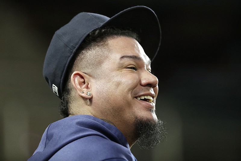 AP file photo by Elaine Thompson / After 15 seasons with the Seattle Mariners, former Cy Young Award winner Felix Hernandez is in spring training with the Atlanta Braves and trying to win a spot in the rotation.