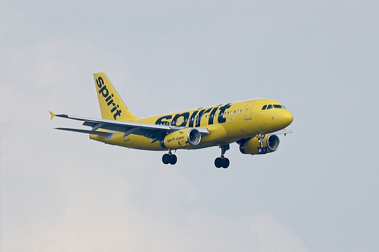 A Spirit Airlines jet comes in for a landing at the airport in Latrobe, Pa., Sunday, July 28, 2019. (AP Photo/Keith Srakocic)