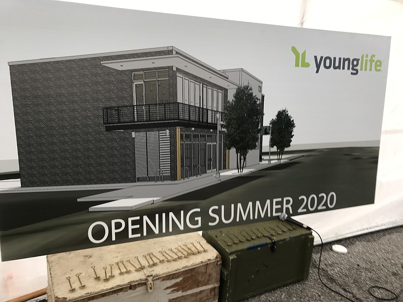 Staff photo by Emily Crisman / Miniature shovels are displayed under a rendering of Young Life's new Chattanooga venue, the organization's first of its kind in the nation, during a groundbreaking ceremony held Feb. 12, 2020.