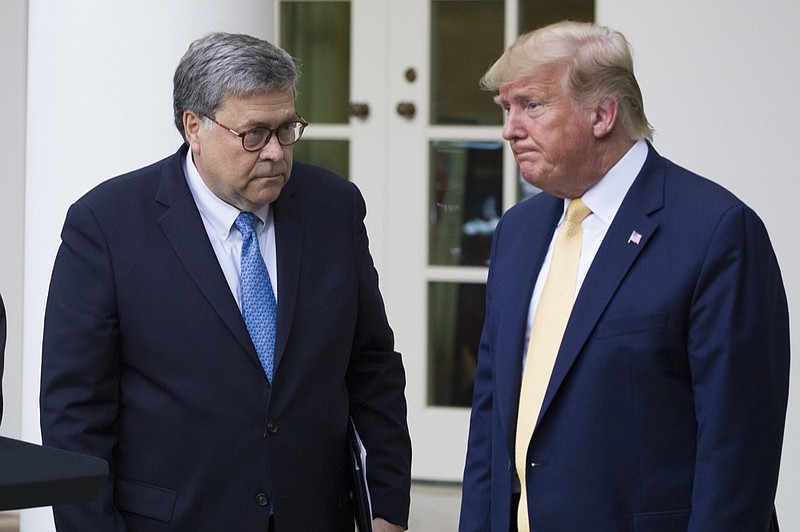 FILE - In this July 11, 2019, file photo, Attorney General William Barr, left, and President Donald Trump turn to leave after speaking in the Rose Garden of the White House, in Washington. (AP Photo/Alex Brandon, File)


