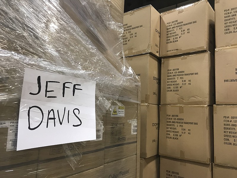 A box of voting equipment in a metro Atlanta, warehouse awaits delivery Friday, Feb. 14, 2020, to Jeff Davis County in Georgia. (AP Photo/Jeff Martin)


