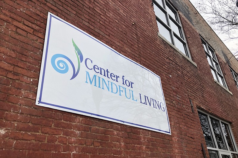 Staff photo by Wyatt Massey / The sign outside the Center for Mindful Living on East Main Street on Feb 9, 2020.