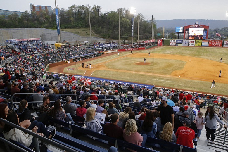 Fans fill the stands on opening night at AT&T Field for a game between the Chattanooga Lookouts and the Montgomery Biscuits on Thursday, April 4, 2019, in Chattanooga, Tenn. / Staff photo by C.B. Schmelter